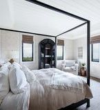 Ceiling treatment in bedroom with window casing and baseboard