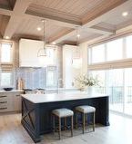 Kitchen with island and ceiling treatment