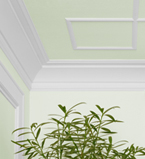Light green ceiling with white casing close up of corner wall and ceiling